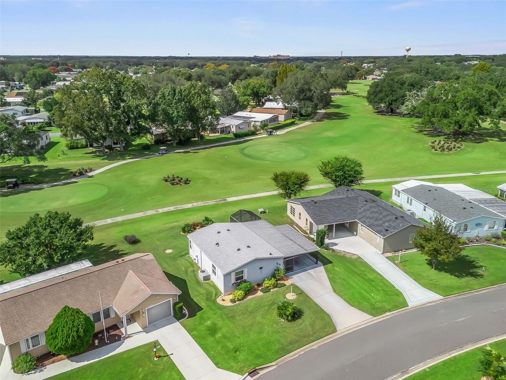 Photo of 1336 E Schwartz Boulevard, Lady Lake, FL 32159 (MLS # G5103522)