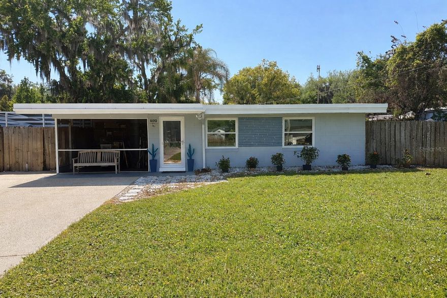 !! PRICED TO SELL !!   WELCOME to this adorable WATERFRONT HOME with an IN-GROUND POOL on a peaceful CANAL with BOATING ACCESS to the HARRIS CHAIN OF LAKES and NO HOA! Upon entry, you’ll find a bright, functional layout with a comfortable living space and scenic water views. This charming home features a COMBINED LIVING ROOM, DINING AREA, AND KITCHEN (with a pantry) that flows into a cozy FLORIDA ROOM, leading to the FIRST SCREENED-IN PATIO AND POOL AREA—creating an exceptional space for relaxing and entertaining guests. Also from the FLORIDA ROOM, you’ll find an ADDITIONAL BATHROOM and LAUNDRY AREA, bringing you to the SECOND SCREENED-IN PATIO. From the LIVING ROOM, there is the MAIN BATHROOM and TWO BEDROOMS—ONE BEDROOM features SLIDING GLASS DOORS leading to the 2ND SCREENED-IN PATIO and has a SEPARATE LAUNDRY HOOK-UP already in place. The private backyard is COMPLETELY FENCED and features a DOCK on the CANAL and a SHED with a REPLACED DECK (both with ELECTRIC), a FIRE PIT, and 2 MINI SHEDS. The home has an updated ENTRY DOOR AND STORM DOOR, a RESURFACED POOL, some REPLACED WINDOWS, an IRON WRAPPER WATER SYSTEM, a BACK-UP SYSTEM for a GENERATOR, VINYL MEMBRANE ROOF (2014), 3 ZONE MINI SPLIT SYSTEM (2018), and a NEWER WATER TANK (2022). The home is conveniently located near Shopping, Restaurants, and Entertainment.