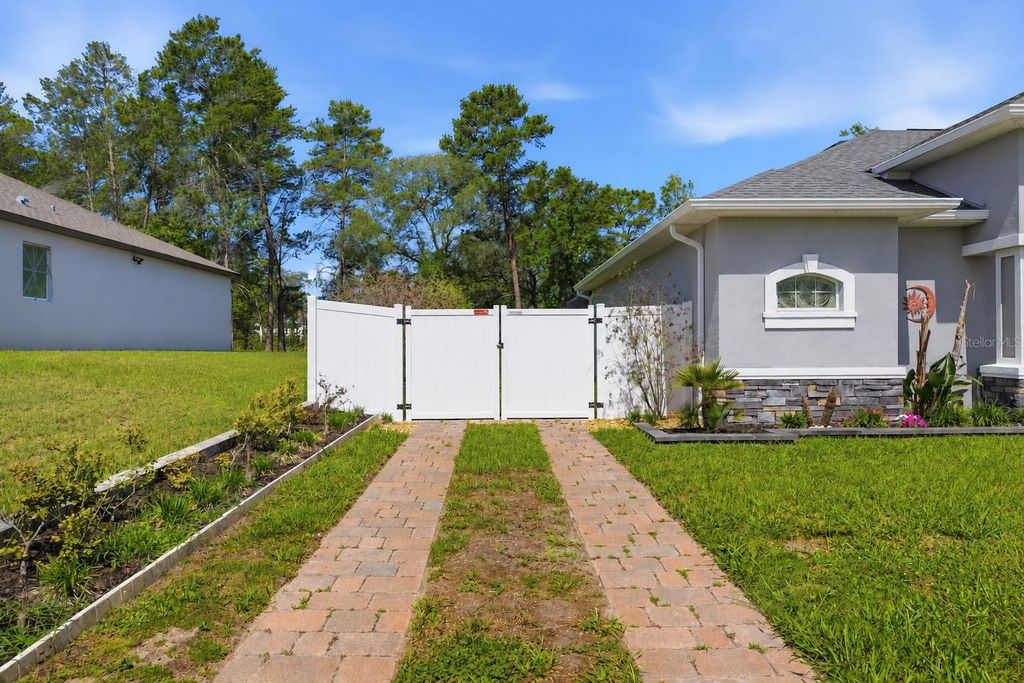 Photo of 13079 Harris Hawk Road, Brooksville, FL 34614 (MLS # W7877553)