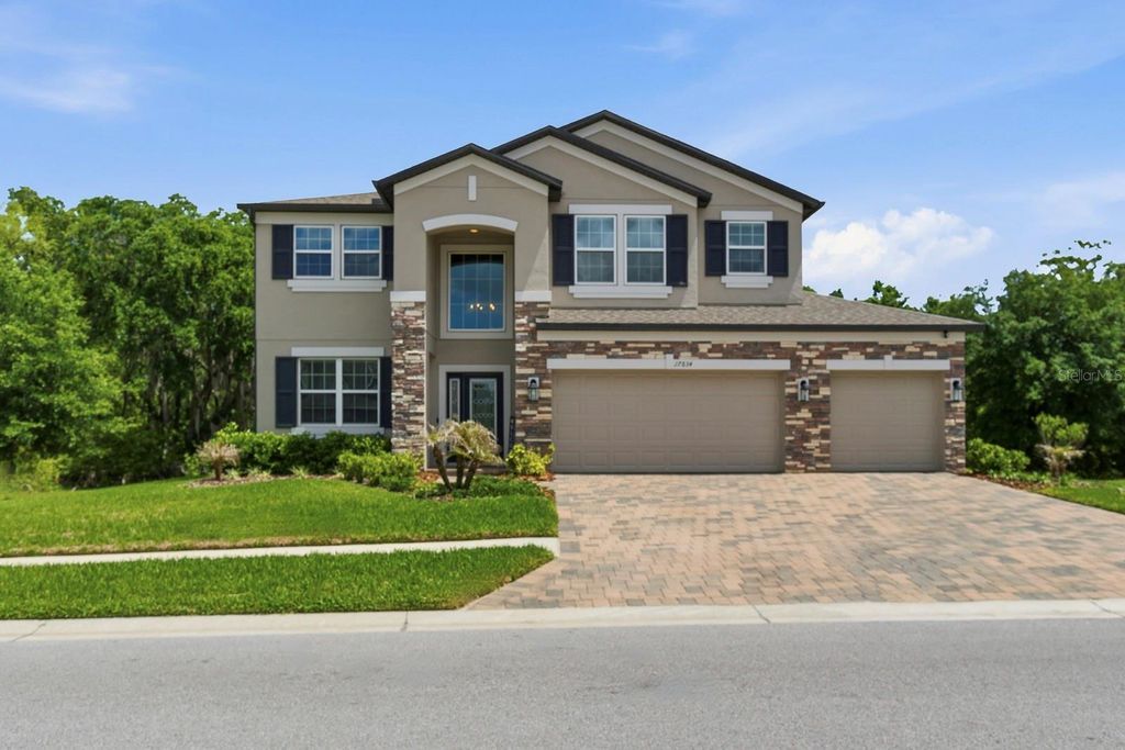 Photo of 17834 Cortes Creek Boulevard, Spring Hill, FL 34610 (MLS # TB8495927)