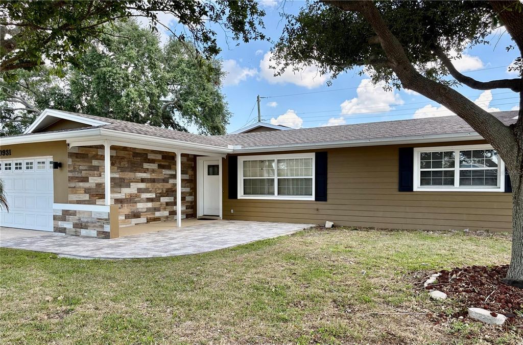 Photo of 10931 Hammock Drive, Largo, FL 33774 (MLS # TB8501365)