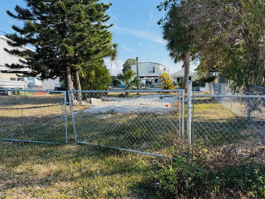 Vacant lot with DIRECT GULF access in Hudson FL. This lot features a floating dock, concrete seawall, power pole and chain-link fencing. Just a few minutes from shopping, dinning and dancing. Great opportunity wont last.