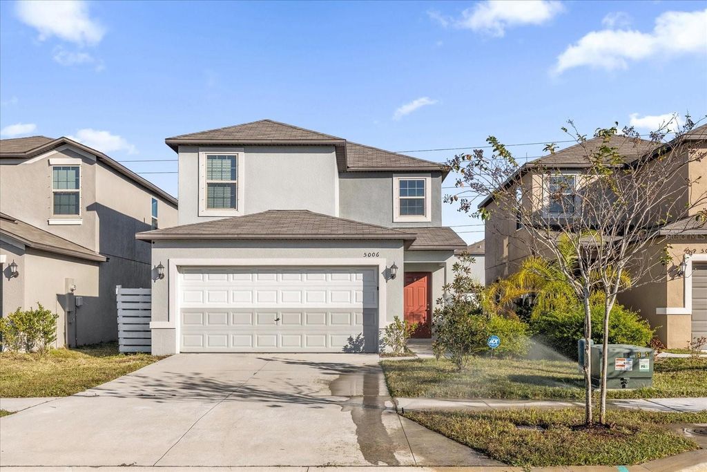 Photo of 5006 Wild Senna Boulevard, Tampa, FL 33619 (MLS # O6360863)