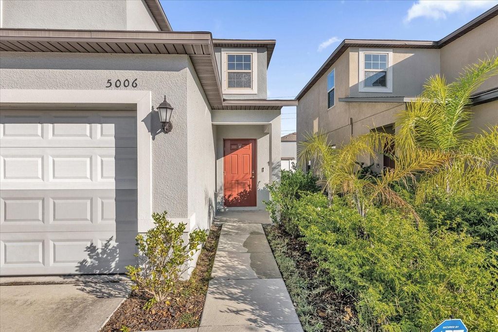 Photo of 5006 Wild Senna Boulevard, Tampa, FL 33619 (MLS # O6360863)