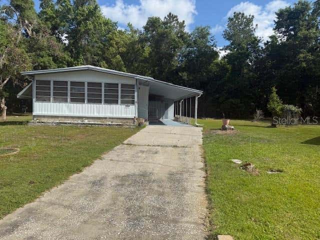 Photo of 7256 Windy Way, Brooksville, FL 34601 (MLS # W7884718)
