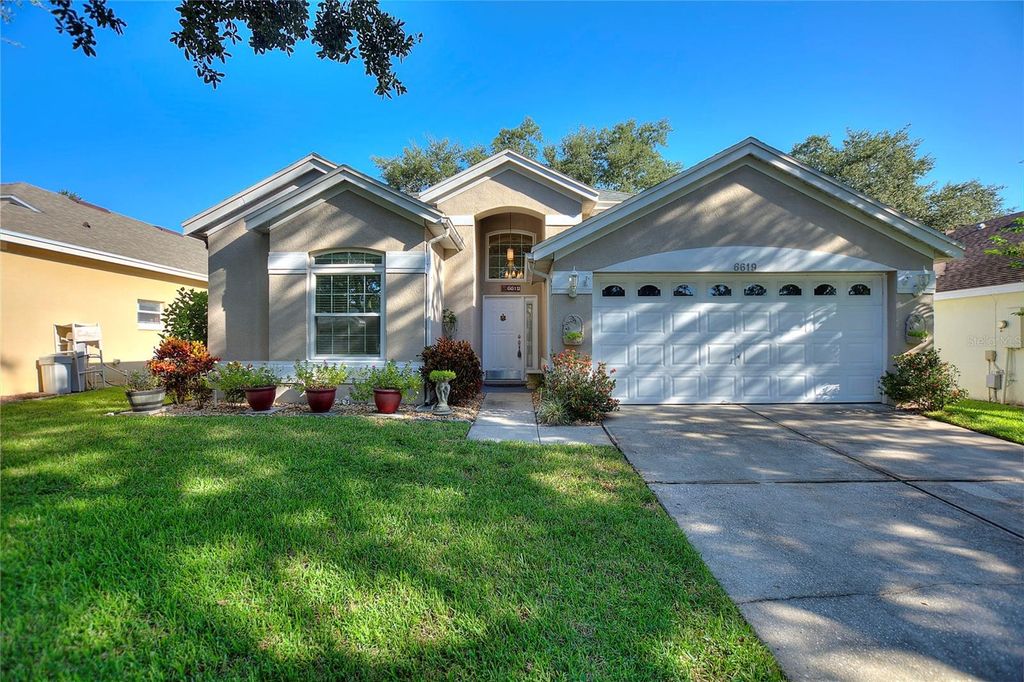 Photo of 6619 Imperial Oak Lane, Orlando, FL 32819 (MLS # O6392783)