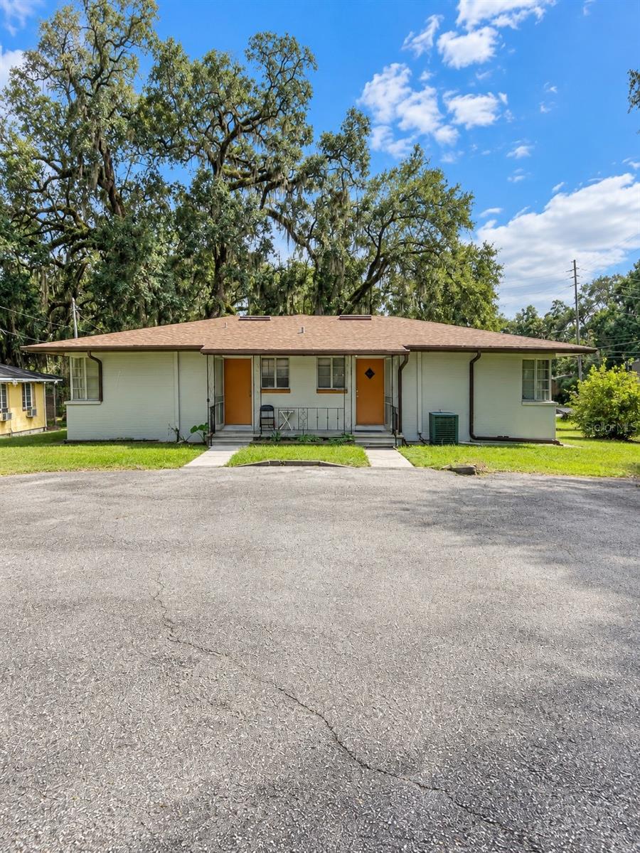 Photo of 701 Palmer Street, Orlando, FL 32801 (MLS # O6443233)