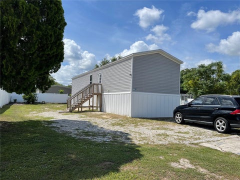 Photo of 6964 Pompeii Road, Orlando, FL 32822 (MLS # S5152172)
