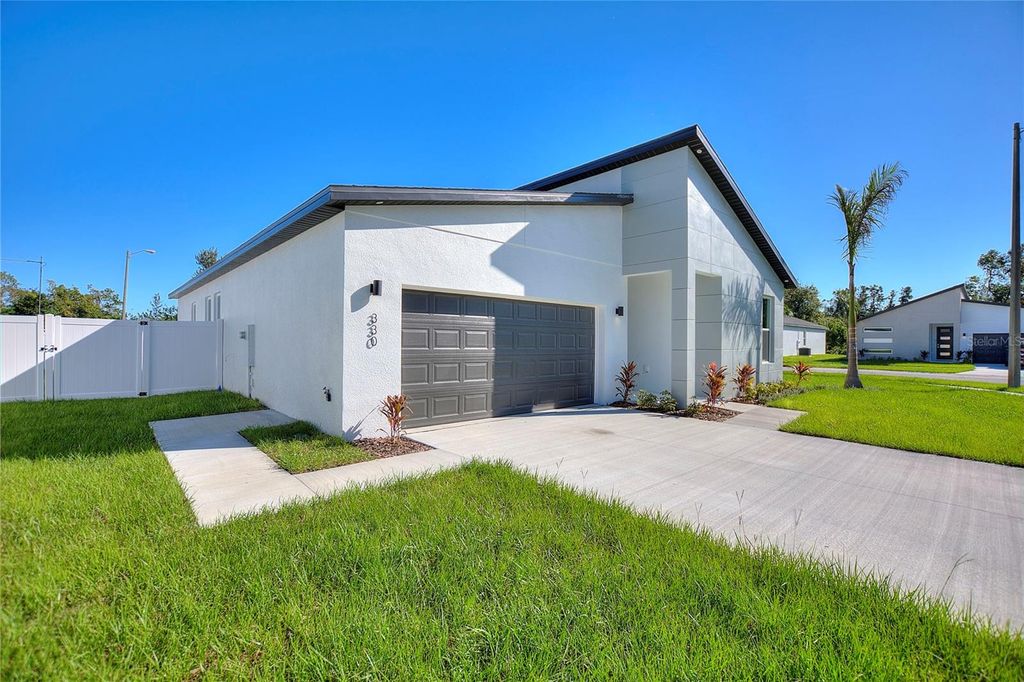 Photo of 330 Royal Palm Way, Winter Haven, FL 33881 (MLS # O6404469)