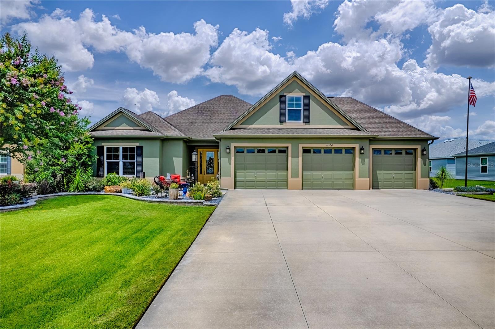 STUNNING Home on Cul-de-Sac in the Family Friendly Community of Oxford Oaks! Be IMPRESSED the moment you arrive by the Impeccably Landscaped Yard and a Welcoming Front Entry! This home has a Stately Foyer and Upscale Finishes throughout including 10' Ceilings, 8-Ft Doors & Plantation Shutters! SARASOTA Model with 4 Bedrooms, 2 Baths, EXPANDED 3-CAR GARAGE & there is ROOM FOR A POOL! You'll LOVE the LIGHT & BRIGHT, OPEN-CONCEPT LIVING AREA w/French Doors leading out to the Oversized Residential Lanai overlooking a Park-like Private Backyard! Remodeled Dream Kitchen equipped with Stainless Appliances, plenty of cabinet & counter space, walk-in pantry, with adjacent Dining area. The Roomy Primary Suite features a tray ceiling, dual sinks & Roman Shower. The two front Guest Bedrooms both with closets share a convenient adjacent bath with tub/tiled shower combo. The 4th bedroom, (often used as a TV room, craft room or game room) with a walk-in closet and mini-split is located on the 2nd floor. The spacious Laundry Room has extra storage cabinets, utility sink and conveys with Washer & Dryer. If you are looking for a GREAT VALUE, a QUALITY HOME & Plenty of Space for Guests &/or Family- you have found it!! Oxford Oaks offers resort-style amenities, including a community pool, tennis & pickleball courts, basketball, playground, and more!! Conveniently located near the intersection of 301 and 466, Oxford Oaks provides easy access to many local shopping, dining, and financial services. The closest square is Lake Sumter Landing Market Square, offering additional dining and shopping options, and free nightly entertainment, 365 days a year!