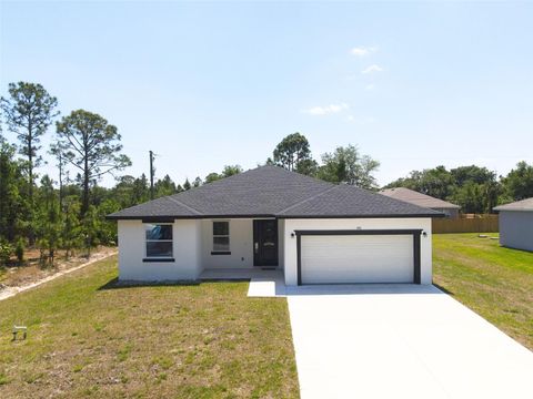 Photo of 410 Flat River Street SW, Palm Bay, FL 32908 (MLS # O6305781)