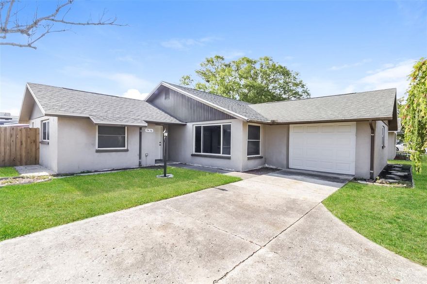 Charm and curb appeal abound for this Port Richey home! Step inside into the inviting foyer and into the living room, positioned at the center of the home. The kitchen boasts stainless steel appliances, hard surface countertops, and ample storage. This split, ranch style floorplan offers the primary suite on one side of the home and a secondary bedroom along with a generous office space on the other. Enjoy your screened porch all year long! Come and see for yourself the opportunities that this home has to offer!