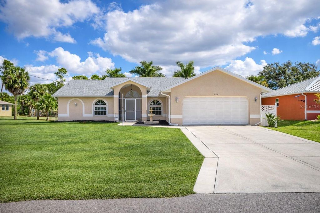 Photo of 1054 General Street, Port Charlotte, FL 33953 (MLS # C7522171)