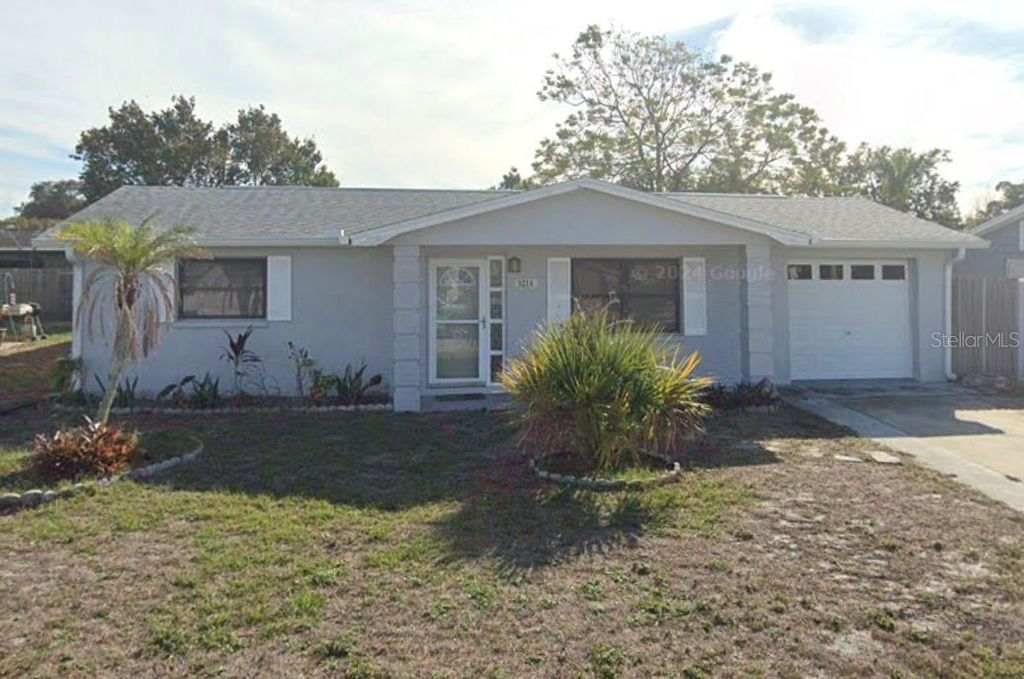 Photo of 3214 Huntington Road, Holiday, FL 34691 (MLS # TB8463055)