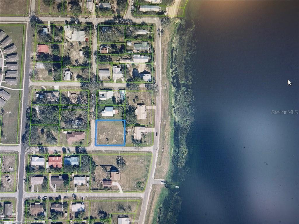 Located on the west side of Lake Tulane this beautiful 0.40 acre Lot has incredible views. Surrounded by beautiful homes and Oak lined streets this lot is completely Cleared and ready for your Dream Home.