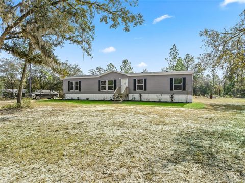 Photo of 16610 SW 53rd Place, Ocala, FL 34481 (MLS # OM714509)