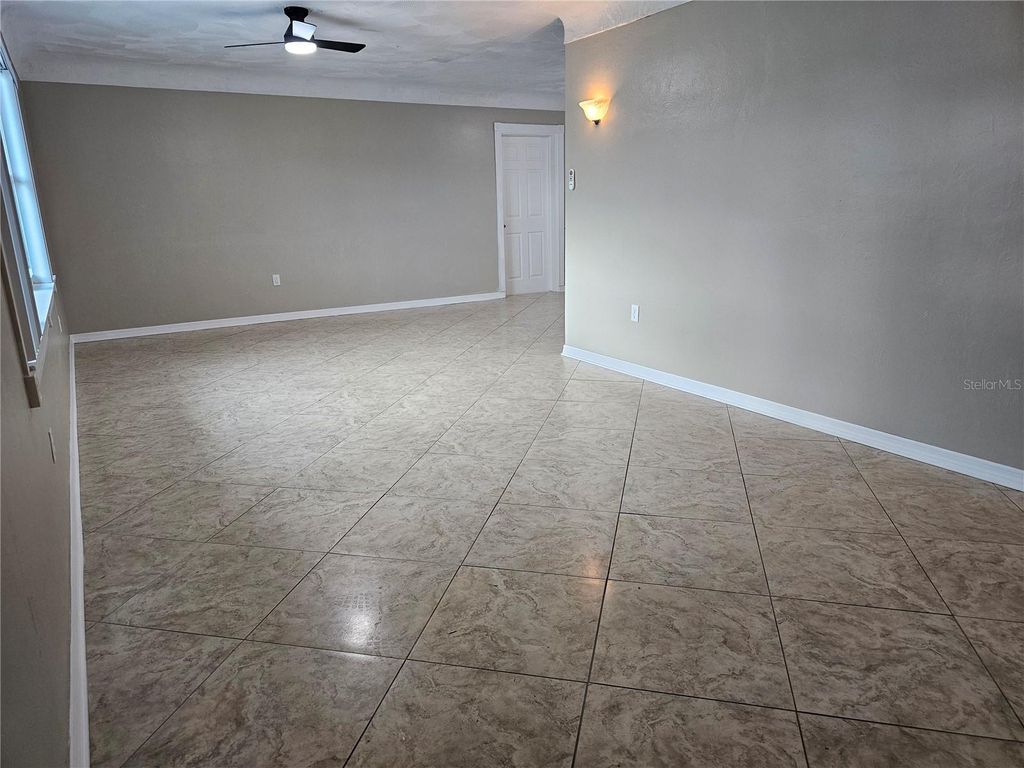 Photo of 4943 Lake Charles Drive N, Kenneth City, FL 33709 (MLS # TB8406565)
