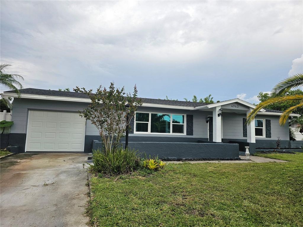 Photo of 4943 Lake Charles Drive N, Kenneth City, FL 33709 (MLS # TB8406565)