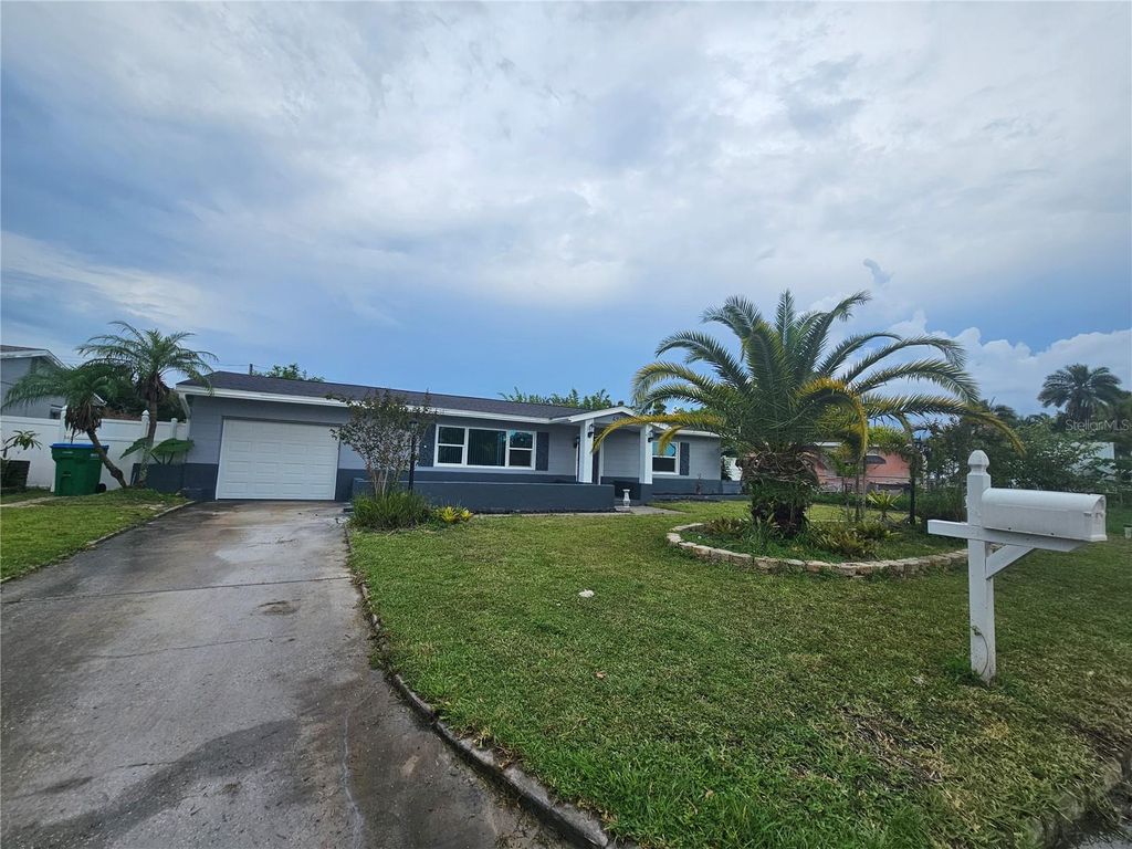 Photo of 4943 Lake Charles Drive N, Kenneth City, FL 33709 (MLS # TB8406565)