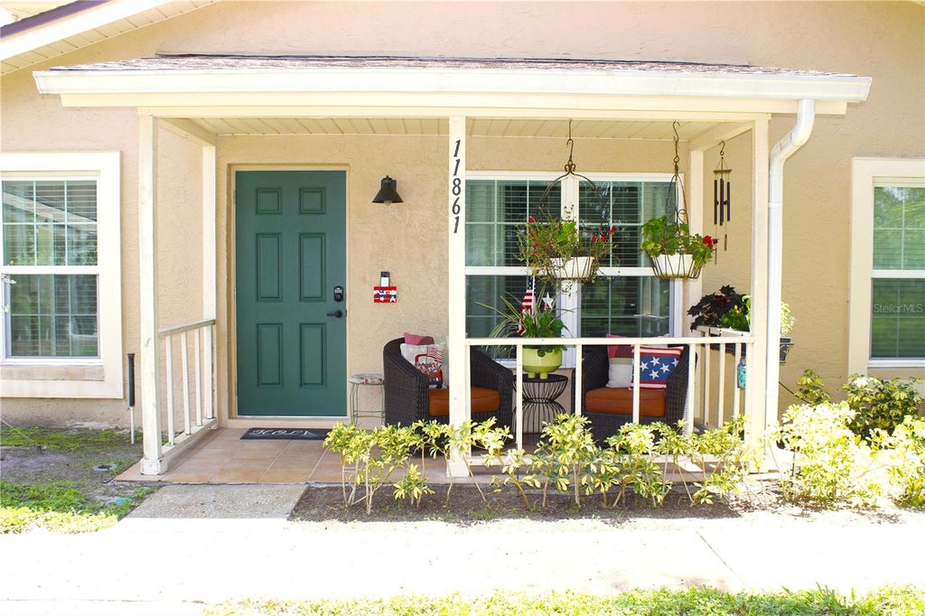 Photo of 11861 Raintree Drive #65, Tampa, FL 33617 (MLS # TB8530454)