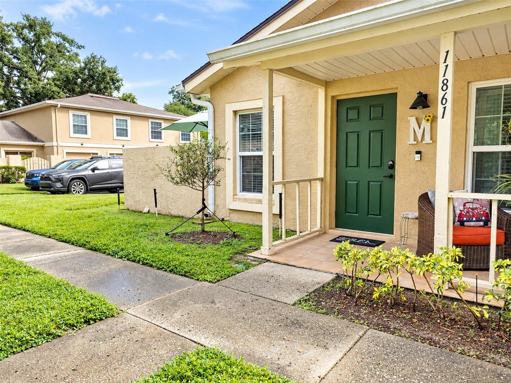 Photo of 11861 Raintree Drive #65, Tampa, FL 33617 (MLS # TB8530454)