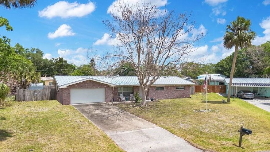 Welcome home to this well-maintained 3-bedroom, 2-bath property situated on an oversized lot, offering space, comfort, and durability. Inside, you’ll find an inviting open layout with ceramic tile flooring throughout the main living areas and carpet reserved only for the bedrooms for added comfort. The kitchen features granite countertops, solid wood cabinetry, and plenty of prep space—perfect for everyday living and entertaining. Step outside to enjoy your private backyard oasis, complete with a large in-ground concrete pool—ideal for relaxing or hosting gatherings year-round. The expansive lot provides ample room for outdoor activities, storage, and more. This property also includes an oversized garage, a storage shed which is a durable metal structure built to last a lifetime—perfect for a workshop, hobby space, or additional storage. Additional upgrades include newer windows, enhancing both energy efficiency and overall appeal. There is also a timeless metal roof that should last for decades to come!  With NO HOA and plenty of room to spread out, this home offers a rare combination of functionality, space, and long-term value. Don’t miss your opportunity to make it yours!