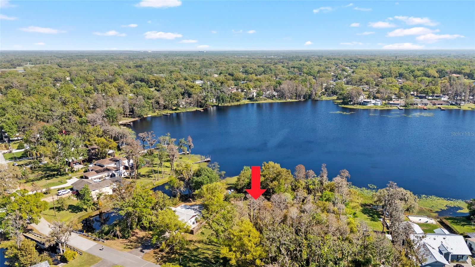 LAKE KEEN LAKEFRONT LOT. SKI, FISH, or just enjoy the view! The last vacant lot left on the lake on Lakeshore Drive! Design the home of your dreams and enjoy lakefront living in Lutz! Close to the Post Office, shopping and yet the lot is tucked away in the back of the subdivision! Build for entertaining, because all your friends and family will want to gather by the lake. Quiet, peaceful, serene escape every time you come home from a busy day! NO CDD AND NO HOA! FEEL FREE TO ENJOY WATERFRONT LIVING! This lot can be financed.
30 ACRE SKI LAKE! NO FLOOD INSURANCE required. Nestled along the serene shores of Keene Lake, this stunning waterfront property offers OPPORTUNITIES FOR WATER SPORTS FROM YOUR OWN BACKYARD! Largemouth Bass is the catch of the day!