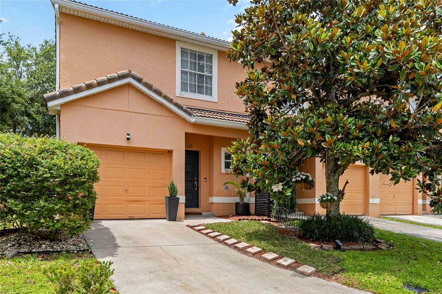 Welcome home to Greenbrook Villas, a quiet and quaint enclave nestled within the desirable Errol Estate community in Apopka! This beautifully maintained, two-story townhome offers 1,517 heated square feet of thoughtful living space, completely outfitted with durable tile flooring throughout. Step through the newer front door into the welcoming foyer into the heart of the home: a bright, open-concept first floor featuring a modern kitchen with granite countertops, an island with a breakfast bar, and an effortless flow into the dining and living areas. Sliding glass doors lead out to an open rear patio, perfect for morning coffee or evening relaxation. The main floor also offers a convenient half-bath and a massive under-stairs storage area, plus an indoor utility zone in the one-car garage. Upstairs, the intelligent layout continues with three spacious bedrooms and two full bathrooms. The primary suite serves as a peaceful retreat, boasting dual closets with built-in features and an en-suite bathroom with newer countertops and a shower/tub combo. Two additional generous bedrooms feature large closets with built-in features and share a full hallway bath also boasting newer countertops and a shower/tub combo. Situated in a rapidly growing area, this property puts schools, medical offices, shopping, and dining just minutes from your front door. Commuting is a breeze with quick access to the 429, 441, and the Florida Turnpike. Best of all, you are just minutes away from outdoor paradise at Wekiwa Springs State Park and Kelly Park, offering world-class kayaking, swimming, and hiking trails right in your backyard!
