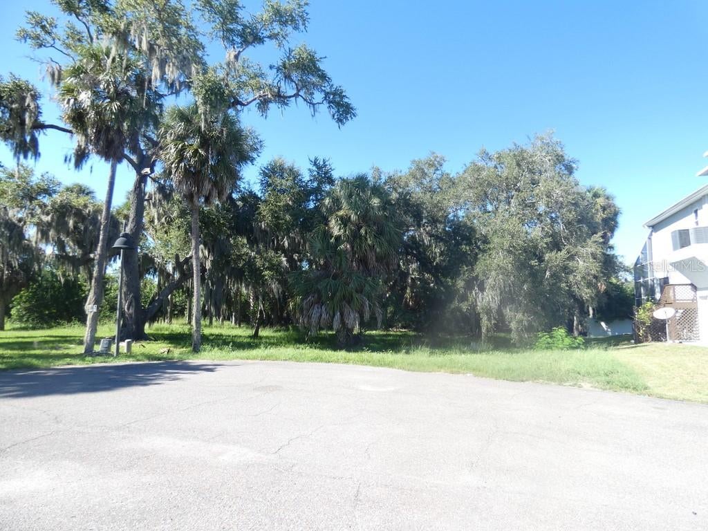 5405 TROPICAL WOODS COURT