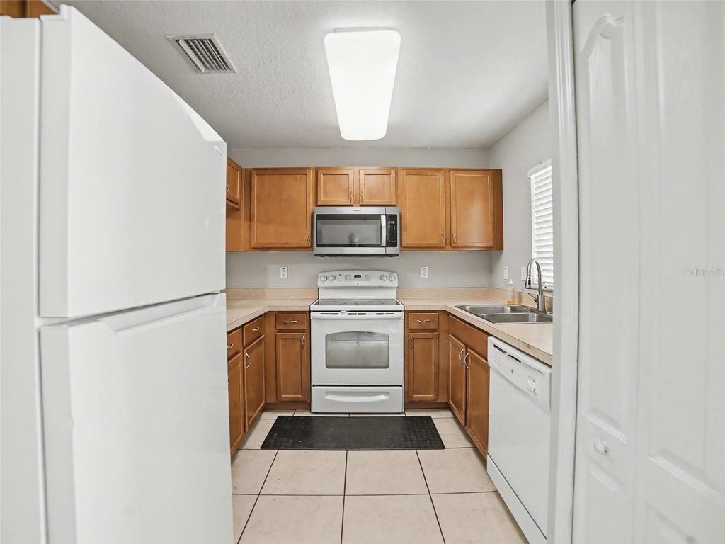 Photo of 12958 Trade Port Place, Riverview, FL 33579 (MLS # TB8485487)