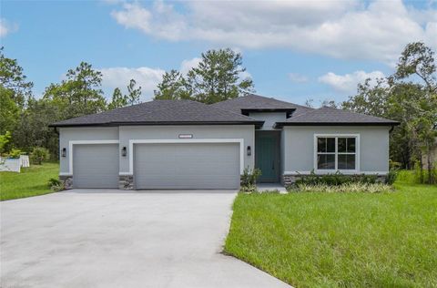 Photo of 11 Bigleaf Court, Homosassa, FL 34446 (MLS # OM707736) Photo of 11 Bigleaf Court, Homosassa, FL 34446 (MLS # OM707736)