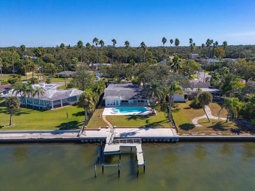 A rare opportunity to own a premier Dunedin homesite has arrived!  Seize the chance to build your dream home on this prime 74-foot waterfront lot overlooking the beautiful Intracoastal Waterway. Located on the iconic brick streets of Dunedin, lined with majestic Washingtonian Palms, this homesite offers unparalleled scenic views and tranquil living.  Enjoy peace of mind with a recently replaced seawall (2021) and the convenience of being just two blocks from the Pinellas Walk/Bike Trail. Imagine driving your golf cart to the vibrant Downtown Dunedin, where you can indulge in exceptional dining, libations, shopping, and lively festivals.  Relish stunning sunsets, abundant seabirds, and marine life right outside your door. Perfect for boating or kayaking, you can easily access Caladesi and Honeymoon Islands, renowned for their miles of pristine white sandy beaches. These lots are rarely available—a fantastic opportunity to build your coastal retreat in a community rich in history, warmth, and seaside charm. Embrace the Dunedin lifestyle and create your own private paradise!
-- This home was impacted by Hurricane Helene and is being sold for the land only --