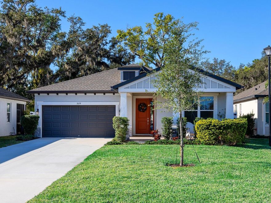 At the end of a quiet, picturesque cul-de-sac, this impeccably maintained three-bedroom, two-bath residence offers a lifestyle defined by privacy, refinement and effortless convenience. No CDD fees and low HOA make this three-year-old home an exceptional value. Waterside and Lakewood Ranch are just a short golf cart ride away, offering premier dining, shopping and entertainment. From arrival, the home makes a striking impression with its oversized multi-car driveway, the longest in the neighborhood, leading to a two-car garage finished with an upgraded epoxy floor. The primary suite serves as a private retreat, featuring tray ceilings, dual closets including a generous walk-in, and a spa like en-suite with dual vanities and a private water closet. The two additional bedrooms are on opposite side of the home. Go outside to the extended paver patio, an ideal space for alfresco dining and relaxed gatherings. The fully fenced backyard provides added privacy and security while framing serene views, as there are no homes in front or behind this particular lot. In a family-friendly community, residents enjoy access to a sports lot with a soccer field, picnic tables, playground and endless walking/bike trails. This exceptional home seamlessly blends luxury, location and lifestyle. There is room for a pool or sun and fun are minutes away and offer passes to suit your every need!