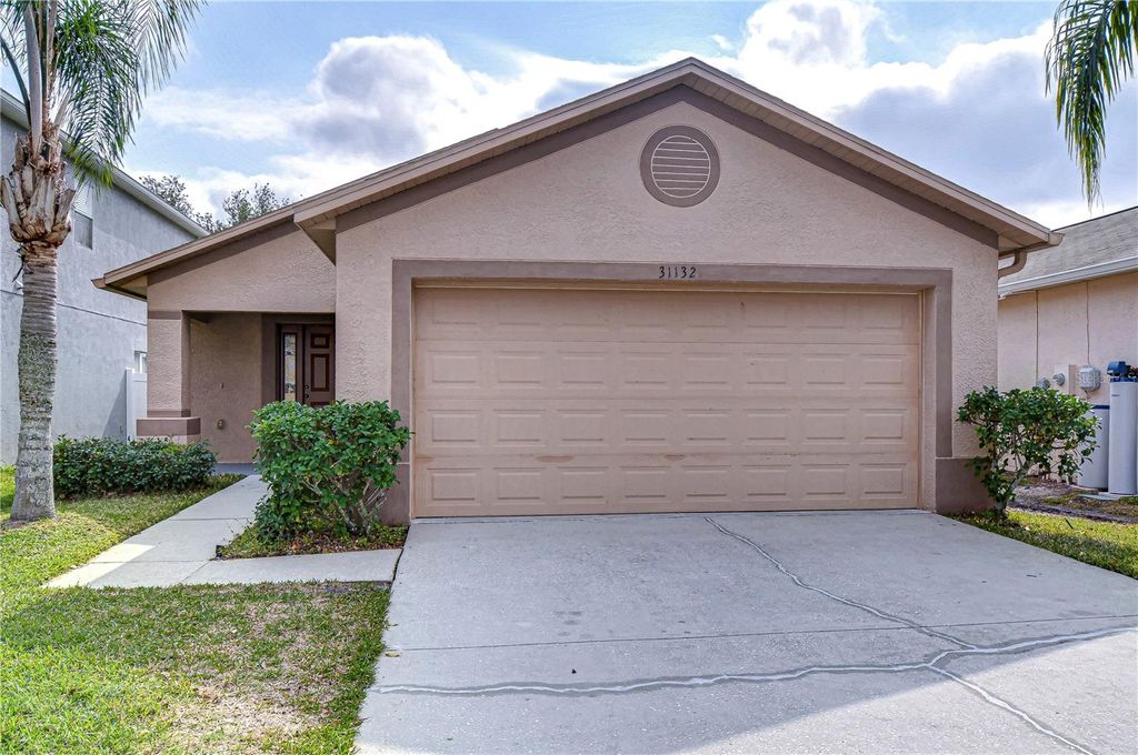 Photo of 31132 Masena Drive, Wesley Chapel, FL 33545 (MLS # TB8348265)