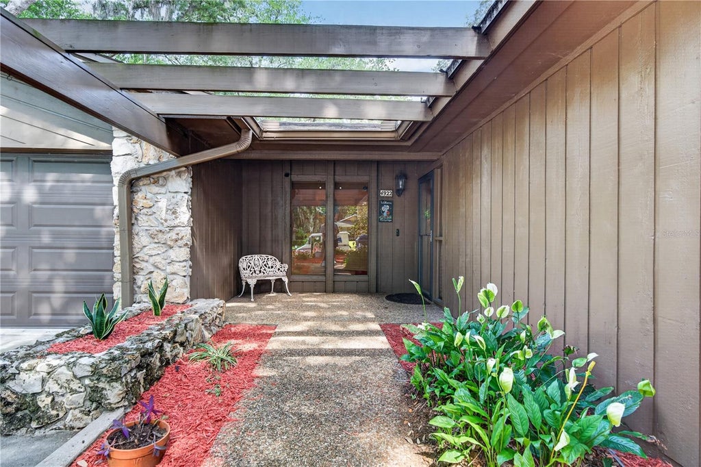 Photo of 4922 Briar Oaks Circle, Orlando, FL 32808 (MLS # O6414887)