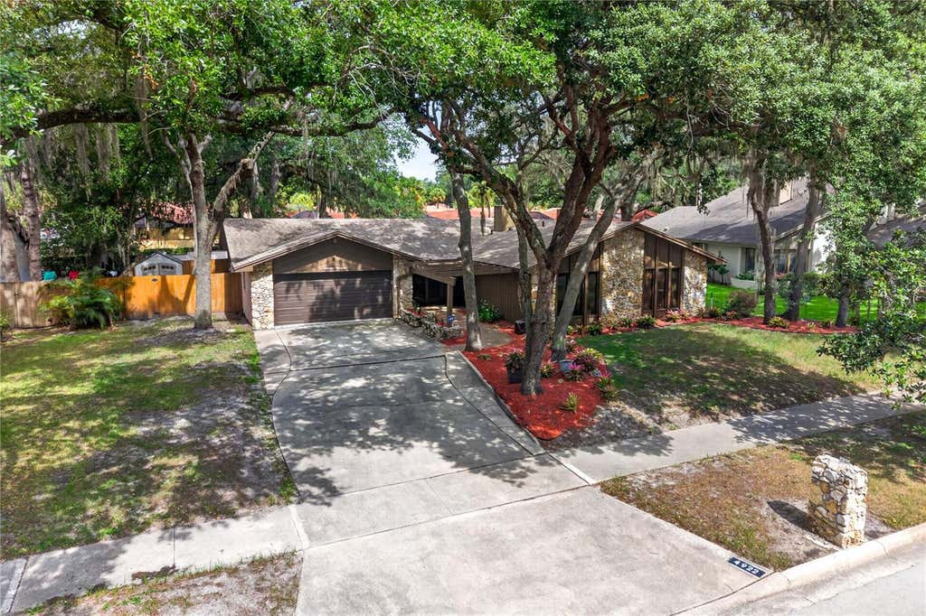 Photo of 4922 Briar Oaks Circle, Orlando, FL 32808 (MLS # O6414887)
