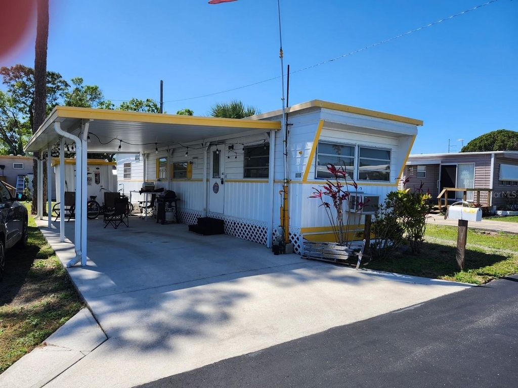 Photo of 12674 Seminole Boulevard #C30, Largo, FL 33778 (MLS # TB8359367)