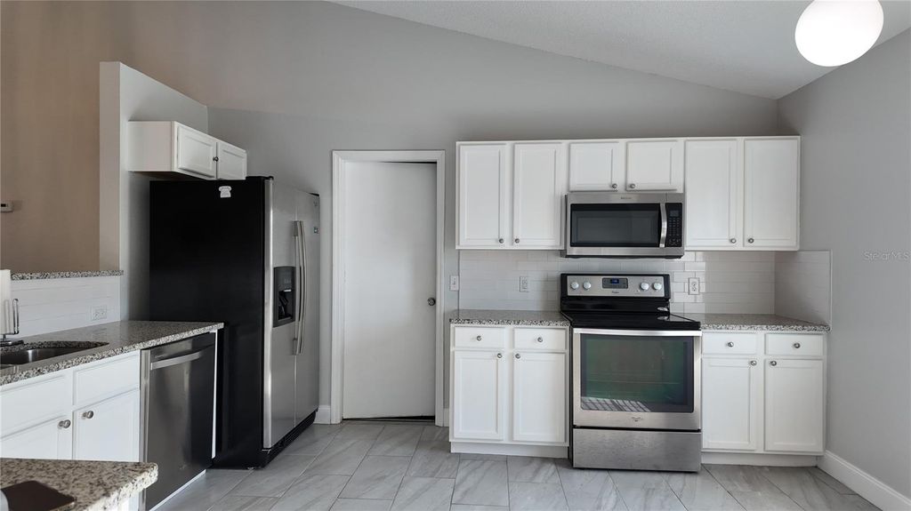 Photo of 446 Arkansas Court, Kissimmee, FL 34759 (MLS # O6366417)