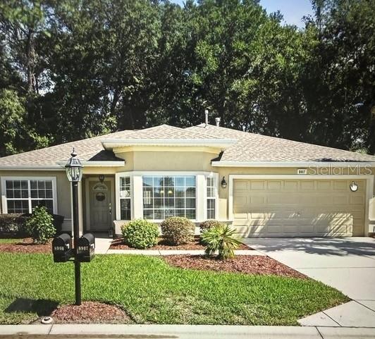 Photo of 8907 SE 141st Loop, Summerfield, FL 34491 (MLS # OM731027)