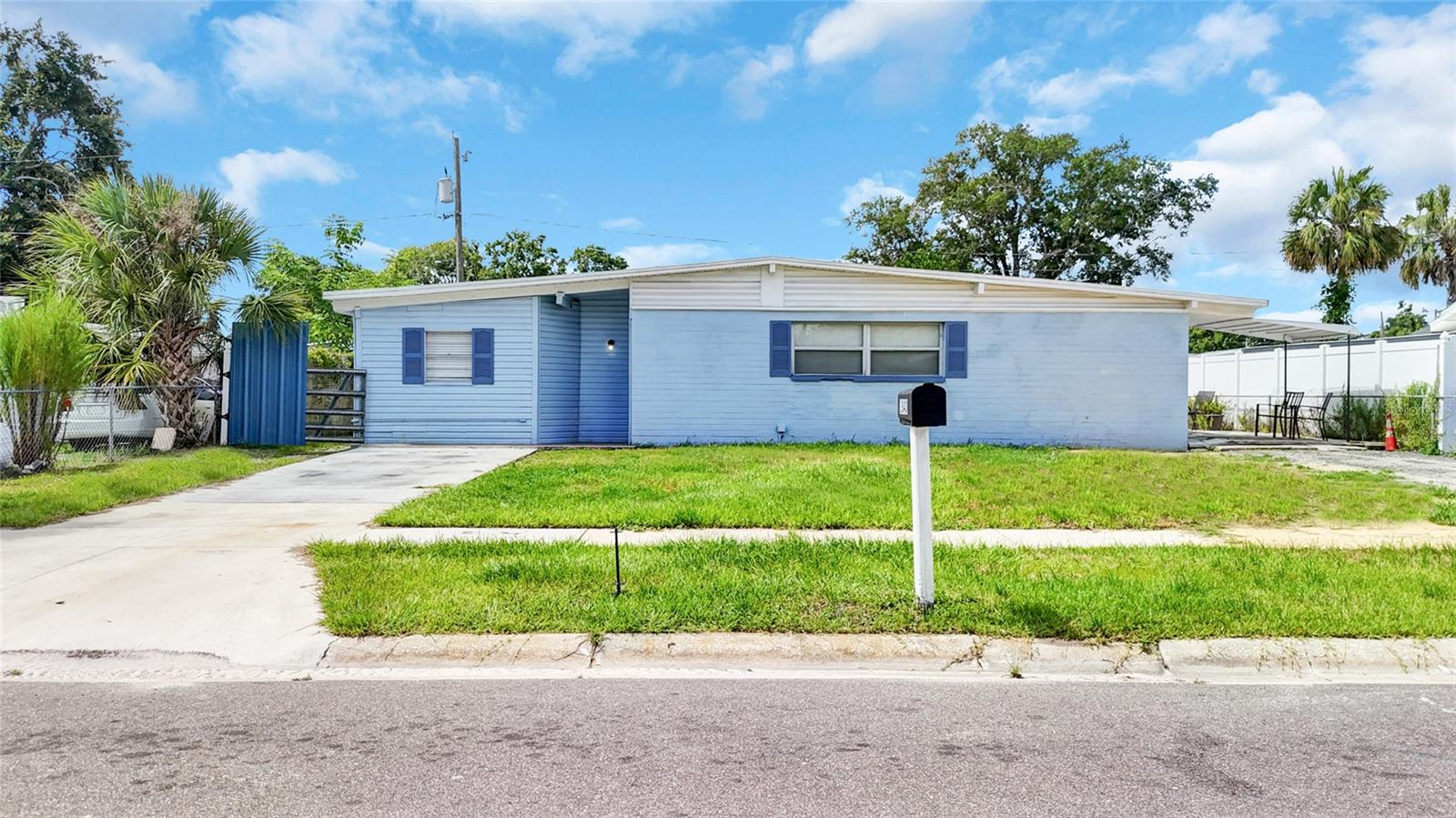 Welcome to this charming 4-bedroom, 2-bathroom single-family home located in the established Clair-Mel City neighborhood of Tampa. With a confortable living space, this home offers a functional layout featuring a bright living room, spacious kitchen, and ample bedrooms for comfortable living. Enjoy the freedom of NO HOA and NO CDD fees. The large backyard provides endless possibilities for outdoor living or future additions. Conveniently situated near major highways, dining, shopping, and just minutes from downtown Tampa. Located in Flood Zone X – no flood insurance required. Perfect as a primary residence or investment opportunity!