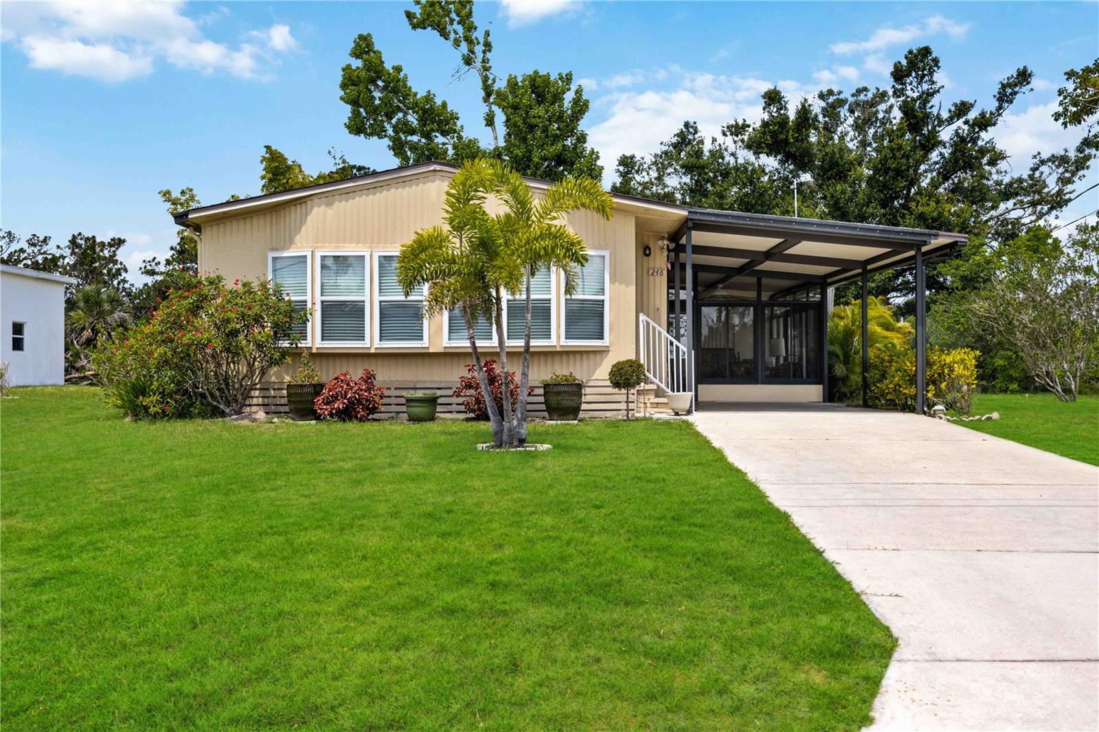 Turnkey! Here is your opportunity to own a turnkey move in ready doublewide in Mobile Gardens! The great room is open to the kitchen and dining room. It offers a perfect spot to entertain. The main bathroom has a tub/shower combo, and the master bathroom offers a walk-in shower. In the kitchen, there is plenty of kitchen cabinets for all your kitchen essentials. The washer and dryer are located in the screened in patio storage room. There is an outdoor shed, and the Craftsman tools are included. Everything you see in this home is staying and all you have to do is move right in. The roof is brand new and was just installed this year. Mobile Gardens is NOT a 55plus community and all ages are welcome. You own the land here. There is an optional $175 a year HOA. HOA fees include use of community clubhouse which includes activities such as, live music, bingo, breakfast, dinners, shuffleboard courts and so much more. Community boat ramp w/ GULF access and first come first serve boat slips gives you the perfect opportunity to launch your own boat out to the gulf. It is a 15 minute to 20-minute boat ride out to the gulf. From this location, you are near downtown Englewood, shopping, and restaurants. Come check out this turnkey manufactured home today, before it is gone tomorrow!