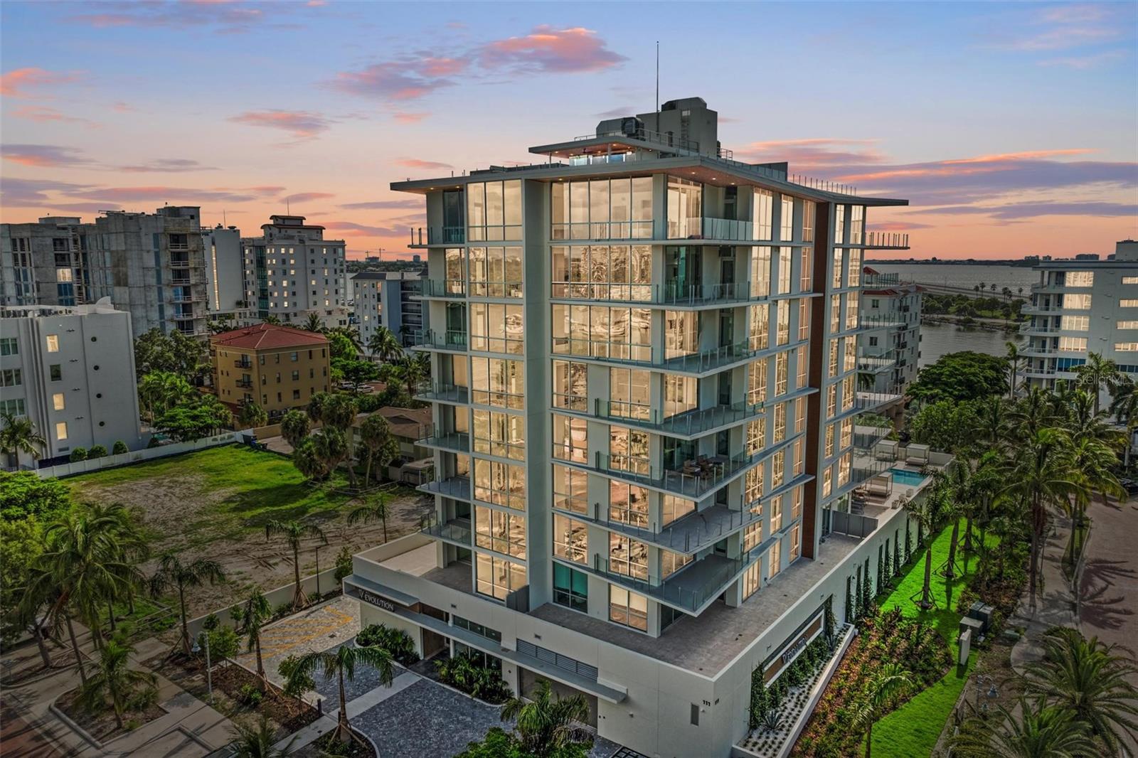 "SELLER SAYS BRING ANY OFFERS"--. Step into Unit 402 at The Evolution, a luxurious condo nestled in the Golden Gate Point neighborhood in the heart of Sarasota. This fourth-floor residence spans 2,314 square feet of refined living space, offering 3 bedrooms, 3 bathrooms and a 2 car garage. The spacious open-concept living area presents breathtaking bay views and high-end upgrades, including Italcraft custom cabinetry, a full lighting package, and floor-to-ceiling impact-resistant windows for a seamless blend of elegance and resilience.
This modern two-tone kitchen is perfect for both everyday living and entertaining, providing all the essentials for crafting culinary masterpieces. Outfitted with premium Sub-Zero and Wolf appliances, meal preparation becomes an enjoyable experience, while the induction cooktop ensures precise, energy-efficient cooking. The kitchen's aesthetic is further enhanced by a sleek quartz backsplash and a quartz waterfall island, which serves as a focal point for gatherings and casual dining. Just beyond, a spacious balcony with breathtaking views invites you to enjoy outdoor living and relaxation.
The primary bedroom offers a serene retreat, a luxurious bathroom featuring custom cabinetry, an shower, and a standalone bathtub with city views. The two additional bedrooms, one with an en-suite bath, are perfect for family or guests. Additional conveniences include an in-unit laundry room and generous storage space throughout.
The Evolution, home to just 20 exclusive condos, offers incredible amenities. When it's time to unwind, head to the rooftop sunbathing deck with a covered outdoor kitchen and barbecue area – the perfect spot for entertaining with stunning 360 views of the downtown and the bay. The clubhouse offers a pool table, sauna, and meeting rooms, providing spaces for both relaxation and productivity. The private concierge service is always ready to assist, ensuring you have access to entertainment and convenience at your fingertips.
Each residence comes with a two-car garage. Some of the additional features include a quick-charging station for electric cars, an on-site car wash, and a grooming studio for your pets.Â
Experience the ultimate in luxury living at The Evolution, where upscale amenities and stunning views of downtown Sarasota and the bay await. Embrace the vibrant lifestyle that comes with living in this remarkable community, where every detail is designed to enhance your quality of life.