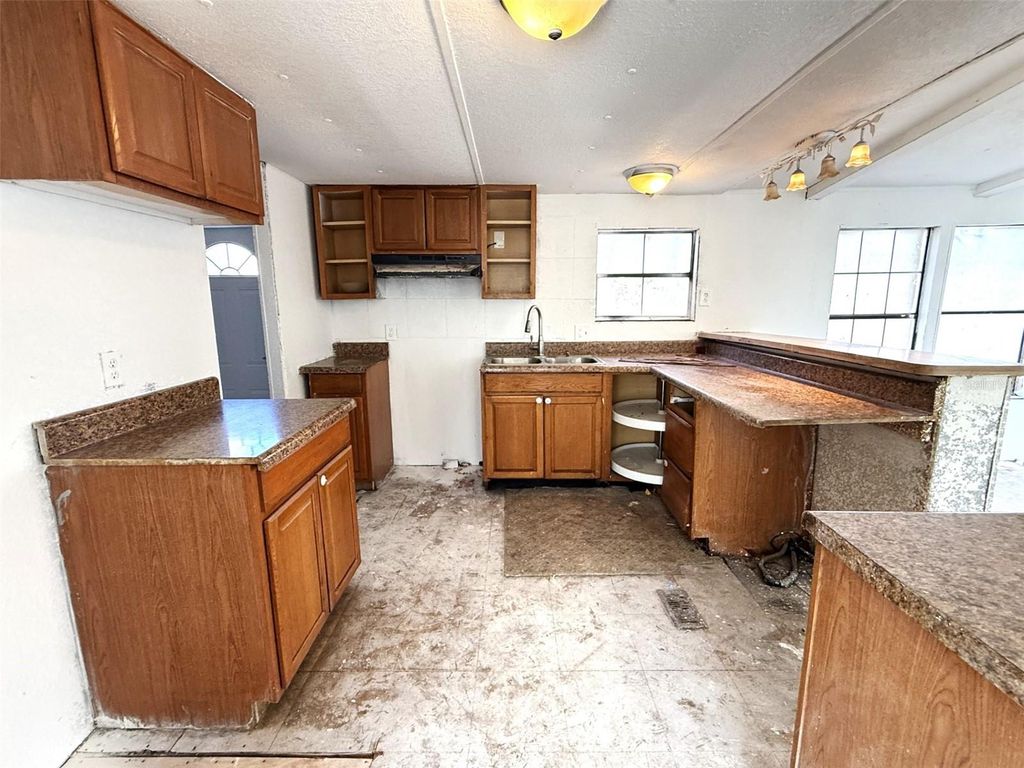 Photo of 5055 Cedar Hammock Street, Lake Wales, FL 33859 (MLS # L4959018)