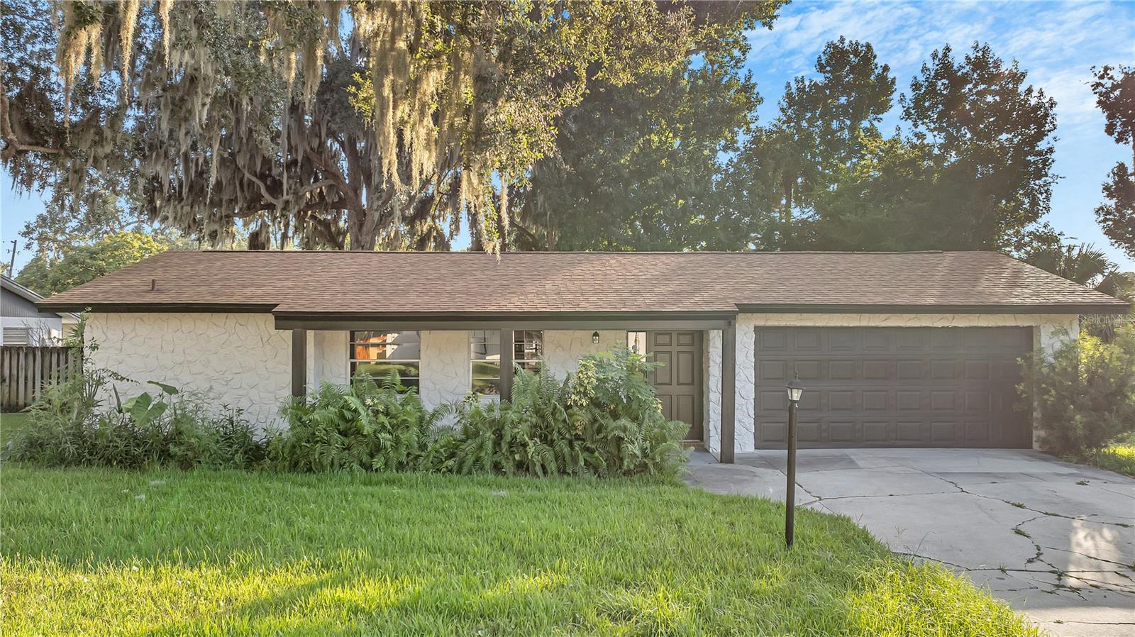 This beautifully renovated 3-bedroom, 2-bath home is the perfect blend of modern design and comfortable living. Step into an open-concept
living space that is both bright and welcoming, with large windows that flood the room with natural light. The living area flows seamlessly into a contemporary kitchen, complete with sleek countertops, stylish cabinetry, and updated appliances, making it an ideal space for both cooking and entertaining. The primary suite offers a peaceful retreat, featuring a spacious bedroom, a luxurious bathroom with modern fixtures, and ample closet space. The two additional bedrooms are generously sized, offering flexibility for a home office, guest room, or family space. Step outside to a charming covered rear patio, perfect for morning coffee or evening relaxation, overlooking a spacious yard that offers both privacy and space for outdoor activities. The home’s fresh flooring and chic finishes add a touch of sophistication throughout, ensuring that every corner of this residence feels updated and new. With all these features and more, this move-in ready home is truly a gem that you won't want to miss!