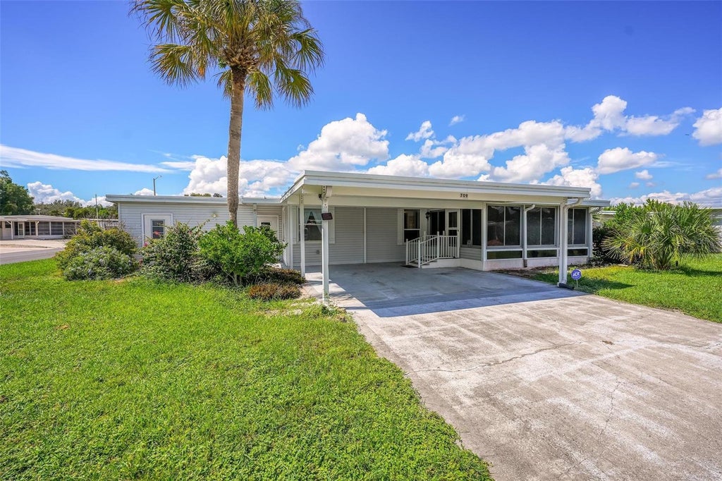 Photo of 709 Bengal Avenue, Tavares, FL 32778 (MLS # G5118078)
