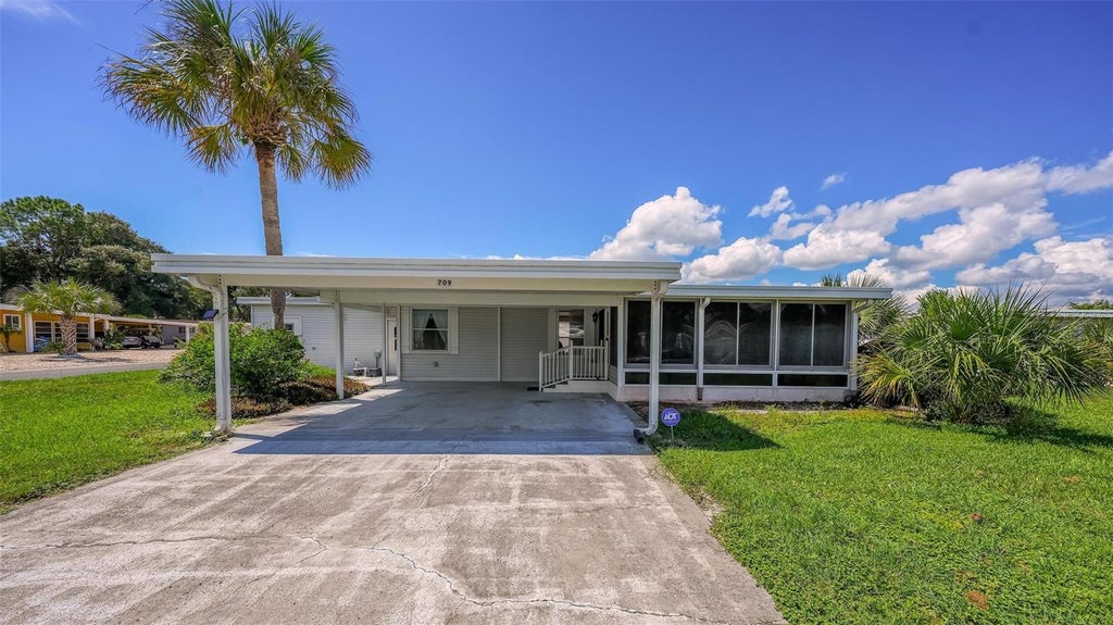 Photo of 709 Bengal Avenue, Tavares, FL 32778 (MLS # G5118078)