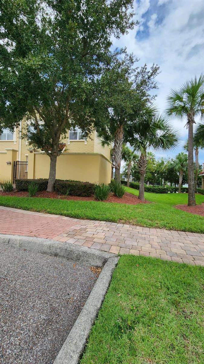 Beautiful 4/3.5 townhouse with an open floor plan at 2616 Bella Vista Drive. This Disney Area resort townhouse is located in the desirable Water Stone Community off Hwy 27, just 3 miles from I-4. The house is in exceptional condition, featuring an open living room/dining room and a fully equipped kitchen—perfect for relaxing after a long day at the parks or on the golf course. With two independent entrances, this property offers a unique opportunity for double rental income, with just small rental remodel, making it an ideal investment or multi-generational living space. READY TO MOVE IN! EASY TO SHOW! LOCKBOX!
