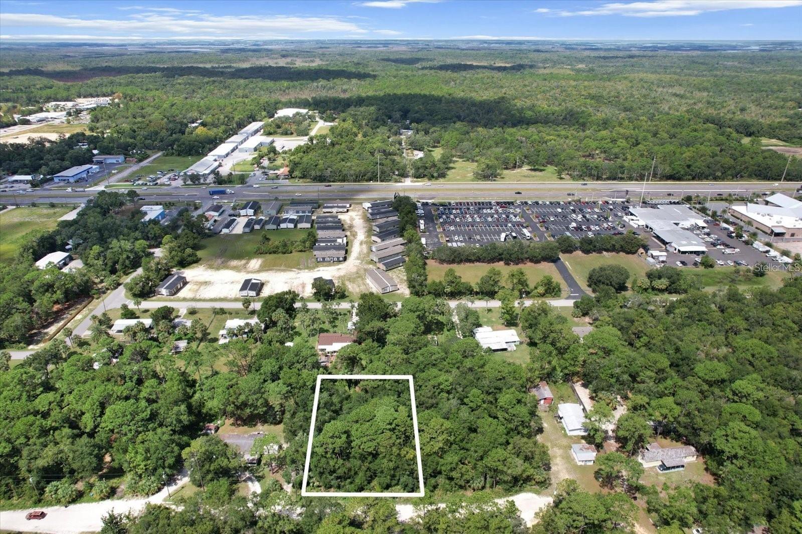 Tucked away in the heart of Florida’s Nature Coast, this .57-acre property in Homosassa offers something you don’t often find—two legally distinct lots bundled into one rare opportunity. With a total of 24,950 square feet, you have the freedom to build two separate residences or design a single estate with room to spread out. Located on a paved road with electricity available, the site is ready for your vision, whether it’s a charming manufactured home, a custom single-family residence, or an investment project that can grow with you.
Living in Homosassa means trading traffic for tranquility without sacrificing convenience. Just minutes away, you’ll find locally owned restaurants serving fresh seafood, unique shops to explore, and all the essentials you need for everyday living. Beyond that, Florida’s natural beauty is quite literally at your doorstep. The Homosassa River winds just a few miles away, offering world-class fishing, boating, and manatee sightings, while Homosassa Springs State Park showcases bald eagles, herons, and the wildlife that makes this area so special.
Whether you envision a peaceful retreat shaded by old Florida oaks or a full-time home base close to everything, this property sets the stage. Versatile, well-located, and surrounded by nature, it’s an investment in both your future and the lifestyle only Homosassa can provide.
