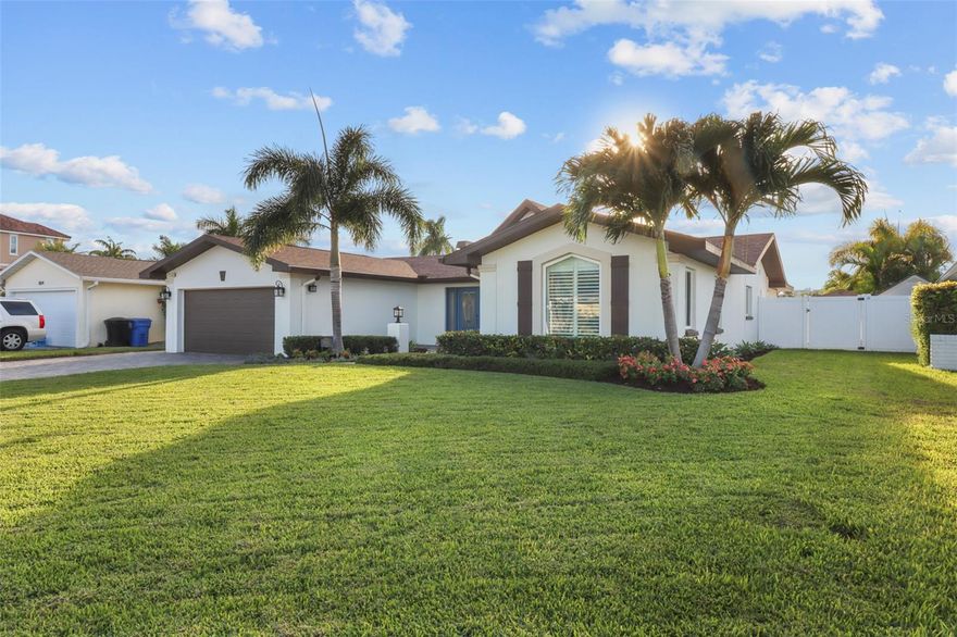 What amenities do you most desire in your new home?  This spacious 3 BR 3 BA renovated home is situated in Yacht Club Estates, the most sought-after neighborhood in St Pete, a community renowned for friendliness and fun, with community clubs and activities to suit every interest.  YCE sits 12 inches higher than any other waterfront neighborhood in the county.  Follow the bricked drive and walkway, cross the threshold into a spacious, open interior.  An independent dining area balances opposite a large, updated kitchen, a kitchen which offers twice the cabinet capacity of standard modern homes.  Impressive.  Seamlessly step from the kitchen area into the family living area, defined by the warm wood tones of the raised ceiling and the built-in fireplace.  Enjoy the ease of natural gas for the fire, kitchen appliances, tankless water heater, dryer and pool.  2016 roof. Terminex warranty in place. Throughout the house, discover new interior doors and hurricane-impact doors and windows.  The glass wall of the family room slides open to bring the beauty of Florida indoors.  Relax in your backyard oasis equipped with an outdoor kitchen, salt water pool and hot tub.  A fresh composite dock leads to a 16000# boat lift which accommodates up to a 38-foot boat. Enjoy an intracoastal cruise and convenient deep water access.  When the day is done,  admire the sunset view from your master bedroom, its bath with dual shower heads and its walk-in closet.  There is even a private loft space where you can watch the clouds drift by if you just need a few moments to get away from it all.  What more could you ask for?  This home is a must-see! Don't miss it!