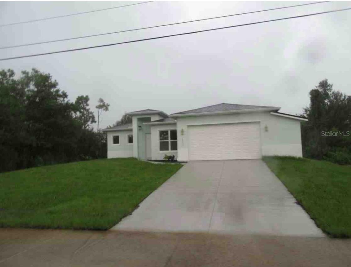 2025 Finished New Construction in South Gulf Cove, Port Charlotte. This home features 3 bedrooms, a home office, 2.5 bathrooms, a 2-car garage, and a 5’x5’ storage room. Open-concept living with abundant natural light and luxury porcelain tile throughout. The chef’s kitchen includes granite countertops, a center island, sleek cabinetry, and premium finishes. The primary suite offers dual vanities, a soaking tub, and a walk-in waterfall shower. Built with large hurricane-impact windows/doors and elevated ground for added safety. Spacious backyard with room for a pool. Located minutes from pristine Gulf beaches, parks, shopping, dining, and entertainment. Ideal for full-time living, seasonal retreat, or investment.